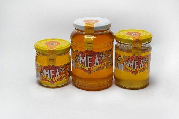 Stockage correct du miel d'acacia en magasin