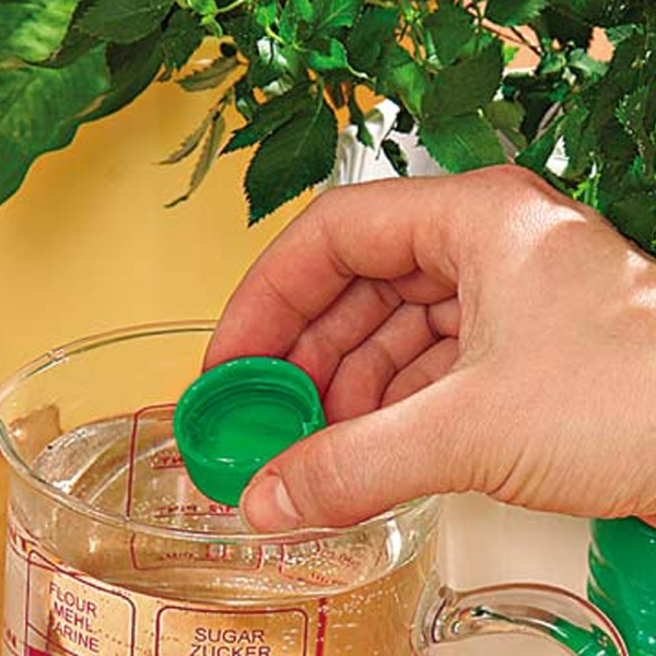 Dilution dans l'eau d'un produit d'inhibiteur d'énergie